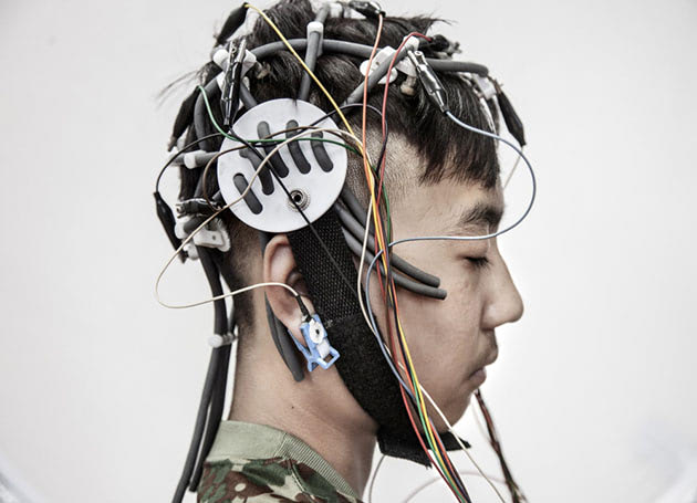 A resident is wired up for electroencephalogram scans to measure brain activity