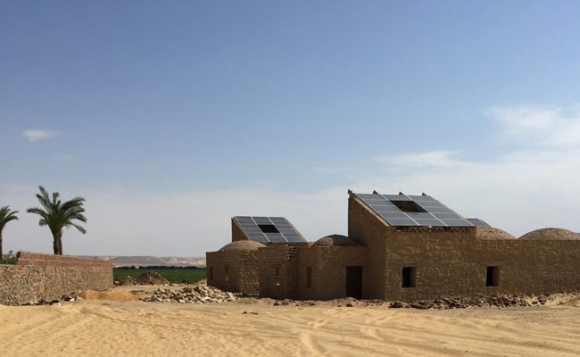 This village is powered by building-integrated solar panels and provides shelter for 350 people, putting sunlight to better use.