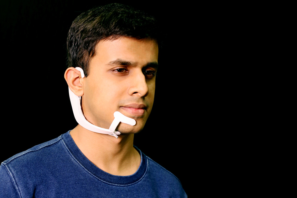Visual of MIT's new voiceless interface can read the words in your head