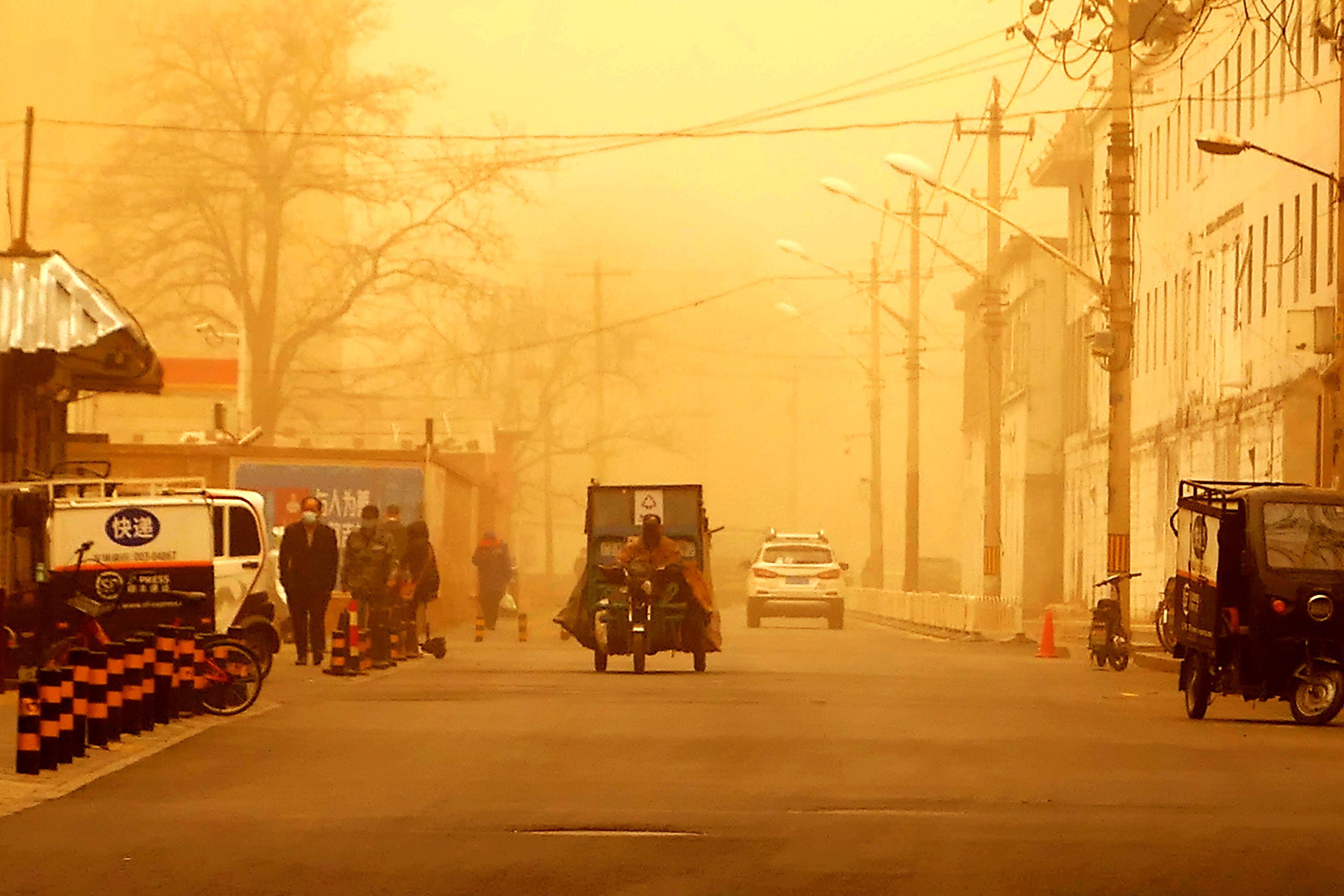 Visual of Beijing's dust storm: part human, part nature